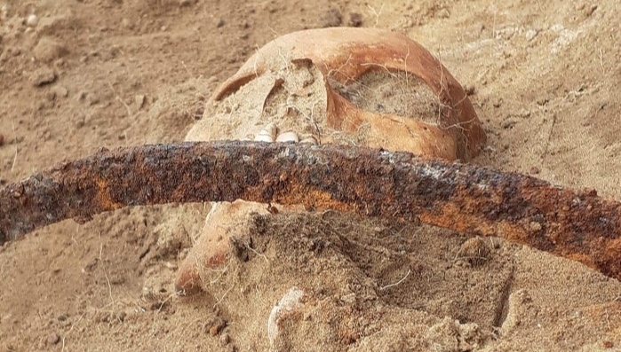 Burial of a woman with a sickle on neck and padlock discovered in a Polish village