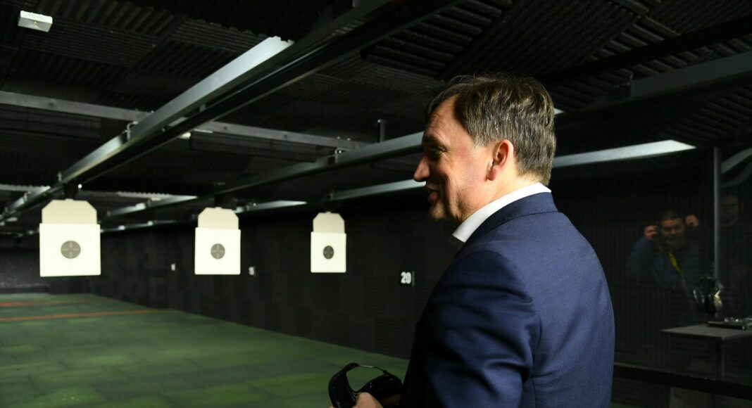 The Polish Minister of Justice has defended his decision to carry a gun, citing a previous death contract taken out against him as justification.