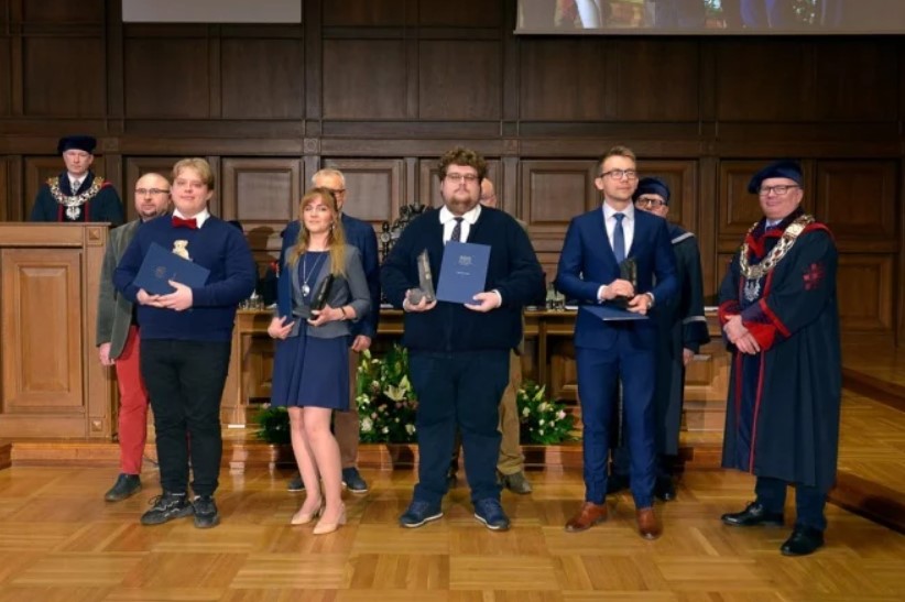 MSc. Kornel Piłat (third from the left in the picture)