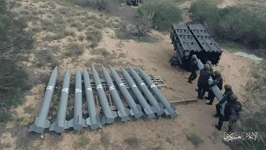 A Hamas video shows the loading of rockets into a multiple rocket launcher.