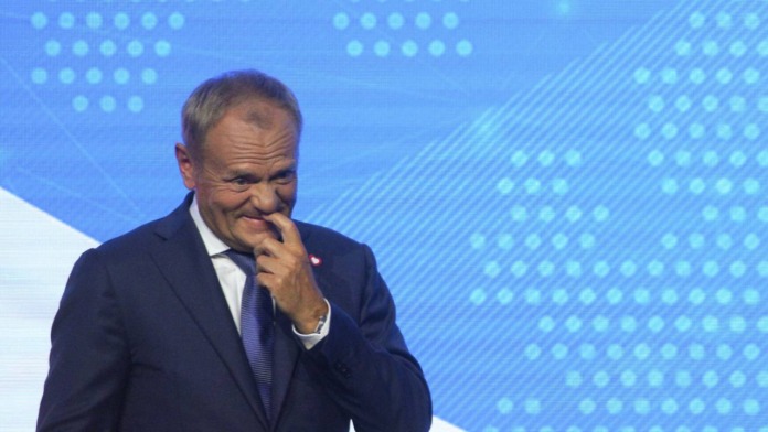 Donald Tusk with a mist of disgust on his face.